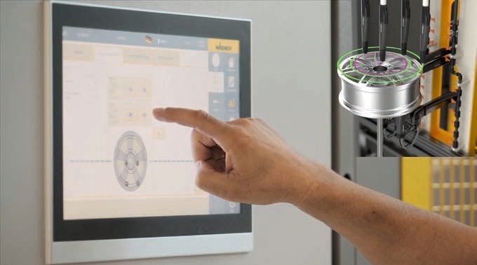 專為汽車(chē)輪轂開(kāi)發(fā)的粉末噴涂系統(tǒng)，通過(guò)觸摸屏進(jìn)行系統(tǒng)配置和控制